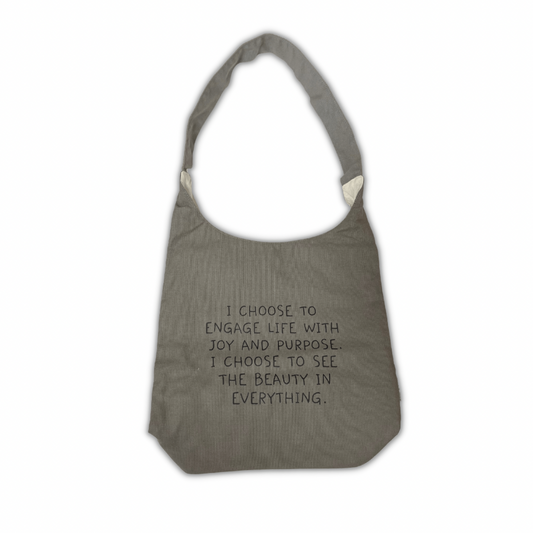 One strap tote with phrase